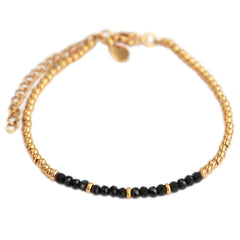 Gold bracelet facet black